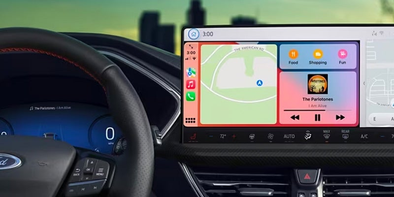 infotainment system displaying gps map music player in the 2024 ford escape plug-in hybrid